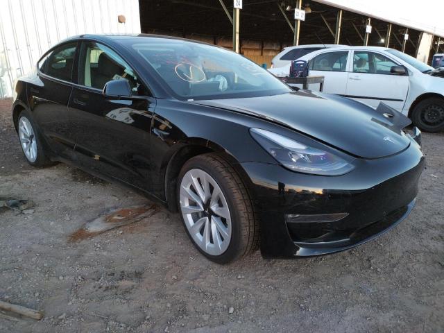 TESLA MODEL 3 2022 with VIN 5YJ3E1EB9NF188590 - Photo from auction