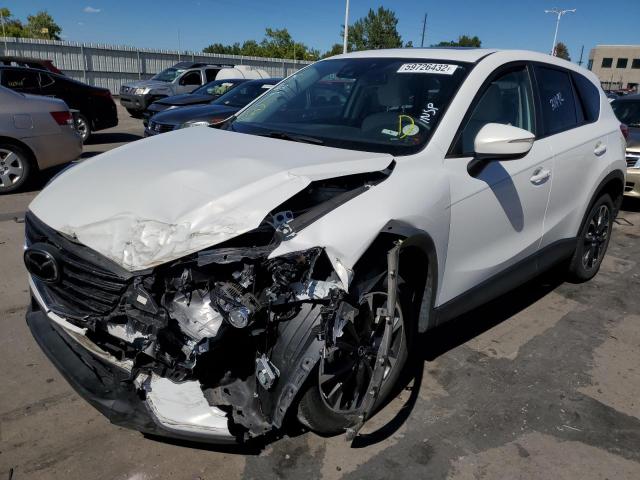 Photo 2 from auction – 2016 MAZDA CX-5 GT with VIN JM3KE4DY4G0618943