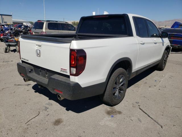 Photo 4 from auction – 2021 HONDA RIDGELINE with VIN 5FPYK3F15MB011458