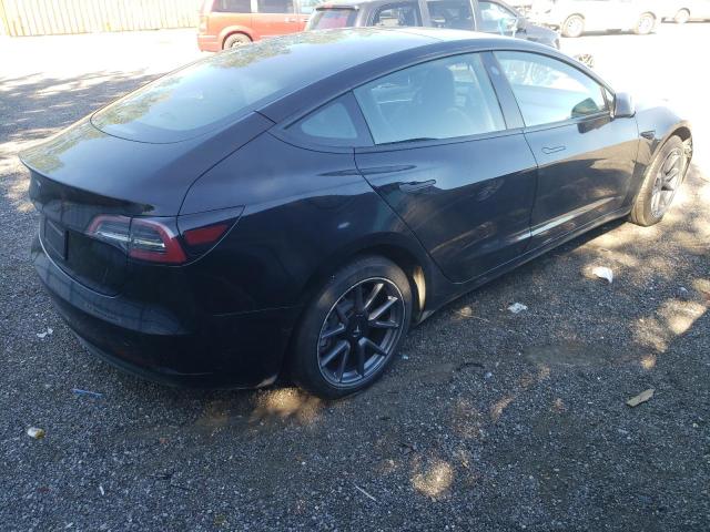 Photo 4 from auction – 2021 TESLA MODEL 3 with VIN 5YJ3E1EA8MF023555