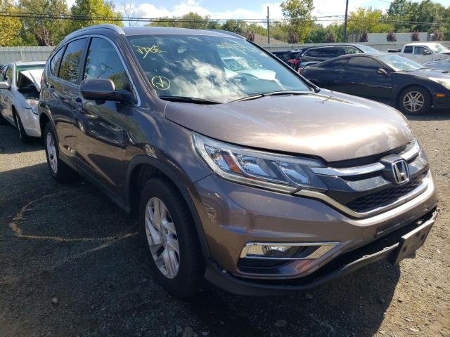 Photo 1 from auction – 2015 HONDA CR-V EXL with VIN 2HKRM4H77FH614933
