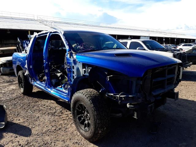 RAM 1500 REBEL 2018 with VIN 1C6RR7YT1JS129429 - Photo from auction