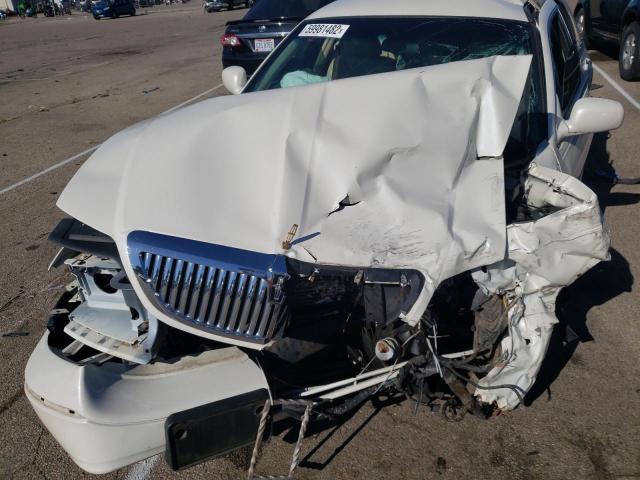 Photo 7 from auction – 2004 LINCOLN TOWN CAR E with VIN 1LNHM81W84Y667491