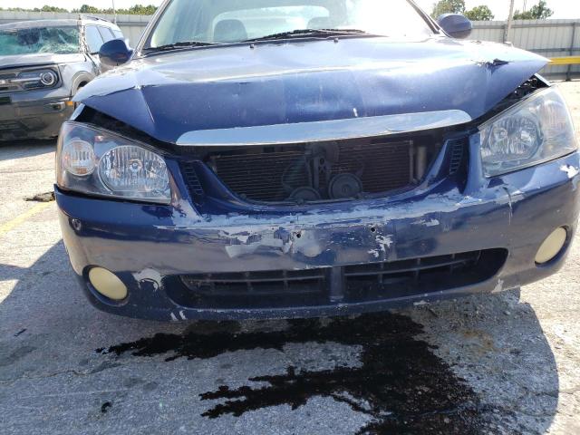 Photo 9 from auction – 2005 KIA SPECTRA LX with VIN KNAFE121355133544