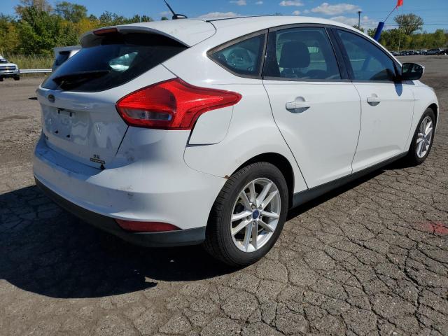 Foto 4 de la subasta – 2015 FORD FOCUS SE con VIN 1FADP3K21FL274558