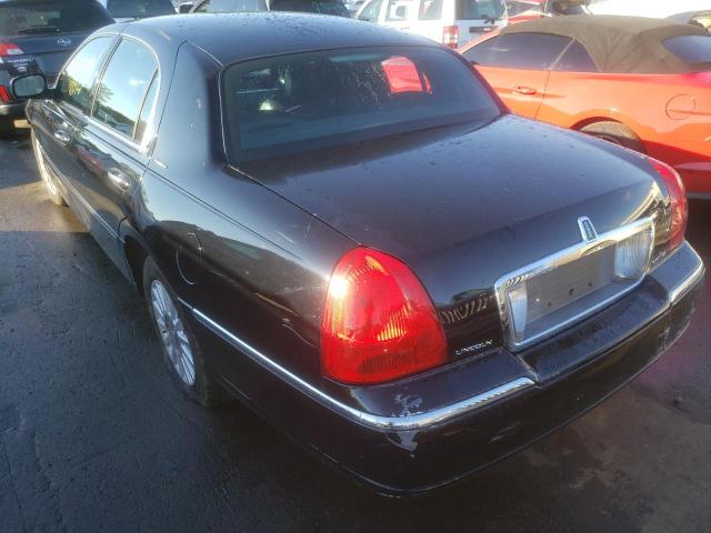 Photo 3 from auction – 2003 LINCOLN TOWN CAR E with VIN 1LNHM81W73Y660661