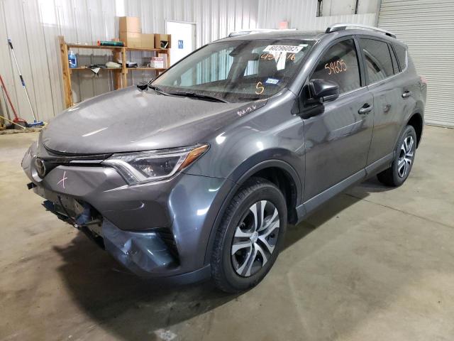 Photo 2 from auction – 2018 TOYOTA RAV4 LE with VIN 2T3ZFREV8JW450216