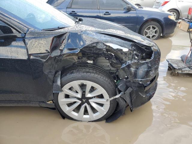 Photo 10 from auction – 2022 TESLA MODEL 3 with VIN 5YJ3E1EB5NF186951
