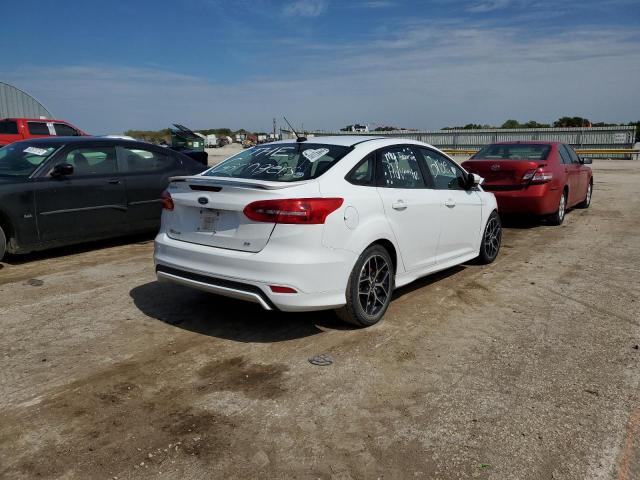 Photo 4 from auction – 2015 FORD FOCUS SE with VIN 1FADP3F2XFL213557