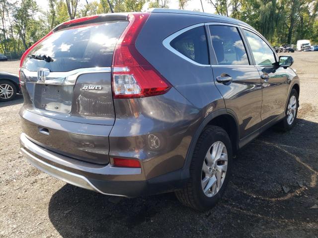 Photo 4 from auction – 2015 HONDA CR-V EXL with VIN 2HKRM4H77FH614933