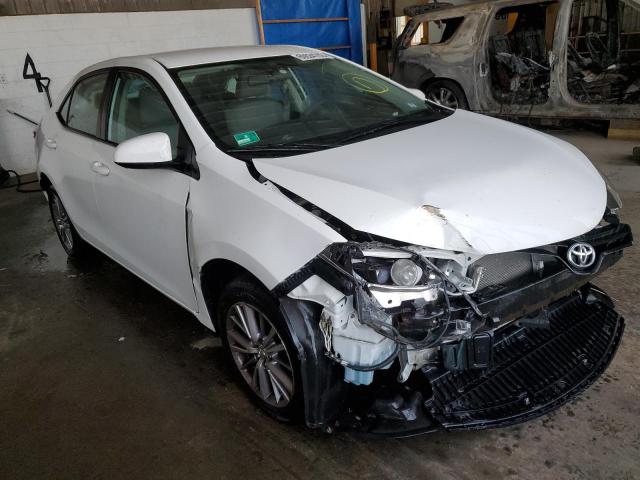 TOYOTA COROLLA L 2014 with VIN 5YFBURHE9EP148064 - Photo from auction