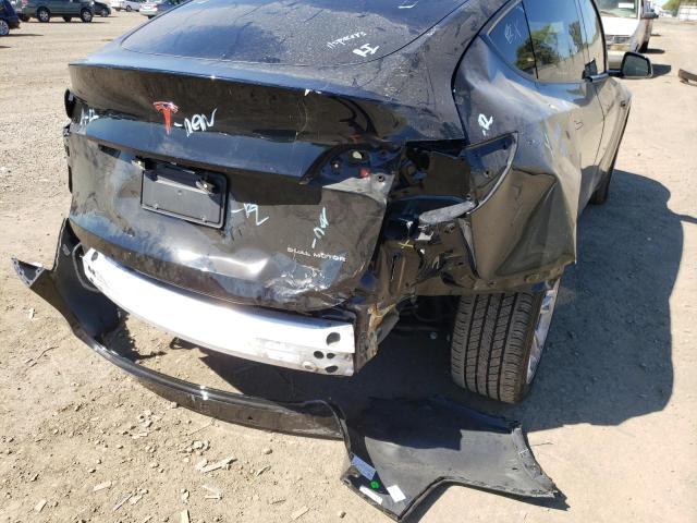 Photo 9 from auction – 2021 TESLA MODEL Y with VIN 5YJYGDEE4MF096524