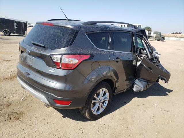 Photo 4 from auction – 2018 FORD ESCAPE SE with VIN 1FMCU9G95JUC63567