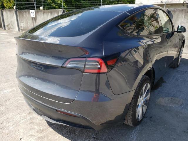 Photo 4 from auction – 2021 TESLA MODEL Y with VIN 5YJYGDED2MF113926
