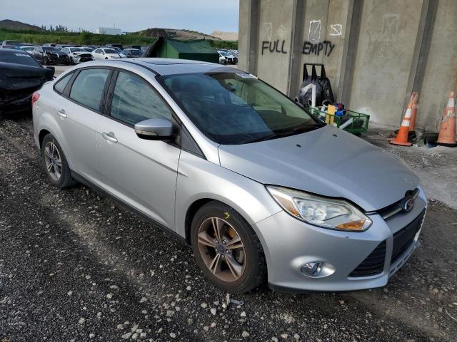 FORD FOCUS SE 2014 with VIN 1FADP3F23EL291984 - Photo from auction
