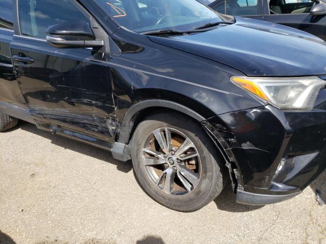 Photo 9 from auction – 2016 TOYOTA RAV4 XLE with VIN 2T3WFREV1GW259734