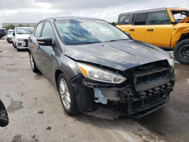 FORD FOCUS SE 2016 with VIN 1FADP3F29GL345386 - Photo from auction