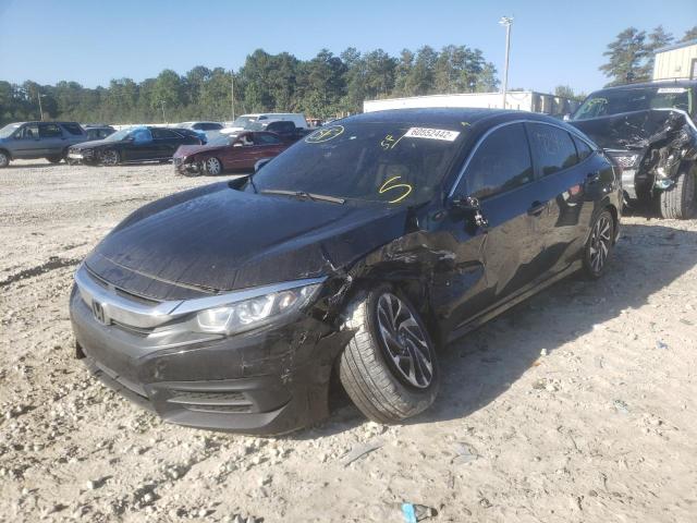 Photo 2 from auction – 2018 HONDA CIVIC EX with VIN 19XFC2F74JE042648