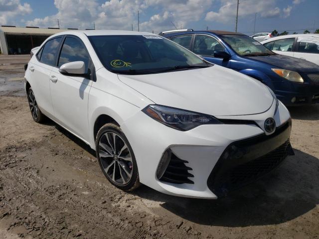 TOYOTA COROLLA L 2018 with VIN 5YFBURHE0JP833435 - Photo from auction