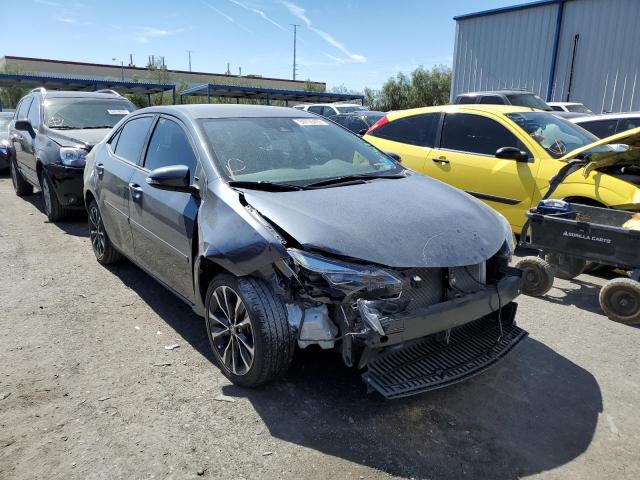 TOYOTA COROLLA L 2019 with VIN 5YFBURHE2KP878541 - Photo from auction