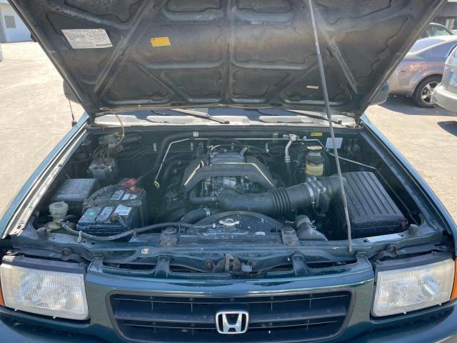 Photo 7 from auction – 1999 HONDA PASSPORT E with VIN 4S6CM58W9X4402399