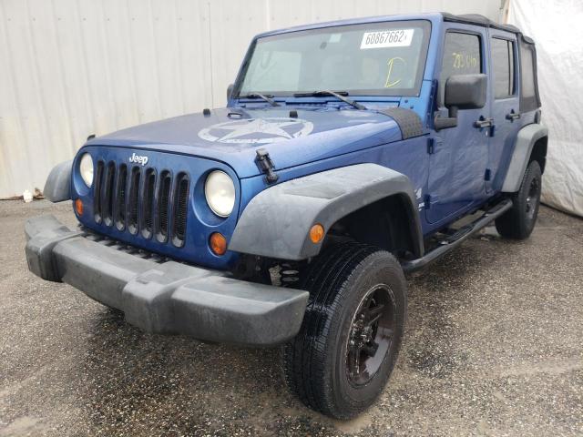 Photo 2 from auction – 2009 JEEP WRANGLER U with VIN 1J4GB39199L753974