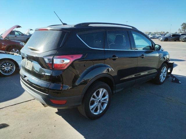 Photo 4 from auction – 2018 FORD ESCAPE SE with VIN 1FMCU9GD4JUB75842