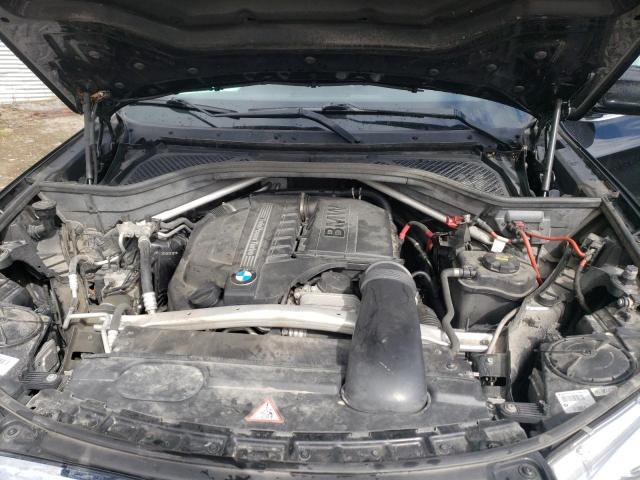 Photo 7 from auction – 2014 BMW X5 XDRIVE3 with VIN 5UXKR0C5XE0K46761