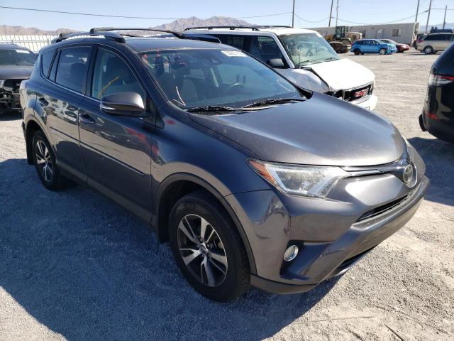 TOYOTA RAV4 XLE 2017 with VIN JTMRFREV4HJ161441 - Photo from auction
