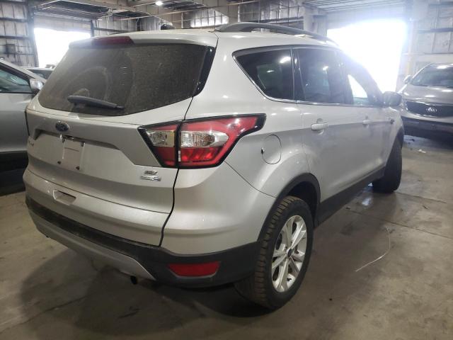 Photo 4 from auction – 2018 FORD ESCAPE SE with VIN 1FMCU9G91JUB48500