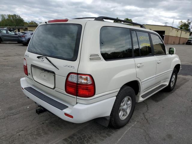 Photo 4 from auction – 1999 LEXUS LX 470 with VIN JT6HT00W3X0036197