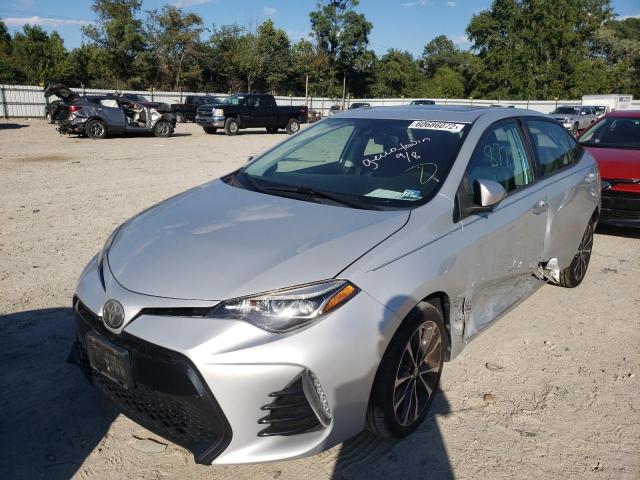 Photo 2 from auction – 2017 TOYOTA COROLLA L with VIN 2T1BURHEXHC891482