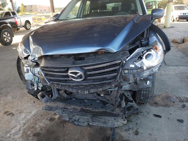 Photo 9 from auction – 2016 MAZDA CX-5 with VIN JM3KE2BY3G0890665