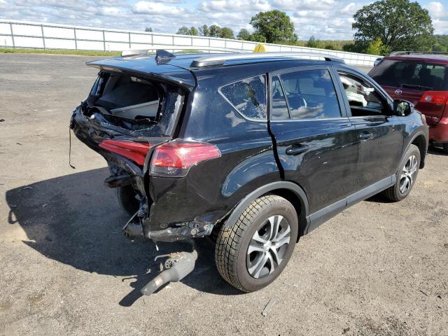 Photo 4 from auction – 2018 TOYOTA RAV4 LE with VIN 2T3BFREV2JW737584