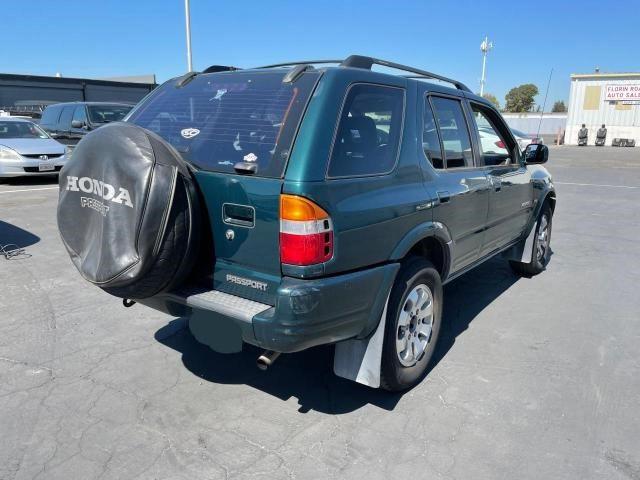Photo 4 from auction – 1999 HONDA PASSPORT E with VIN 4S6CM58W9X4402399