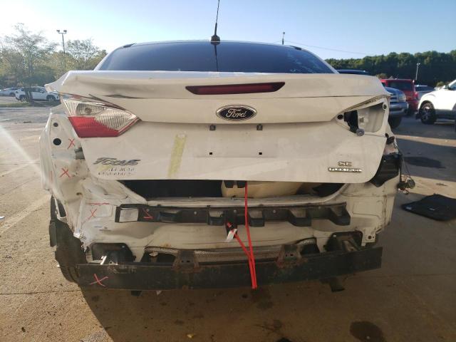 Photo 9 from auction – 2014 FORD FOCUS SE with VIN 1FADP3F28EL332724