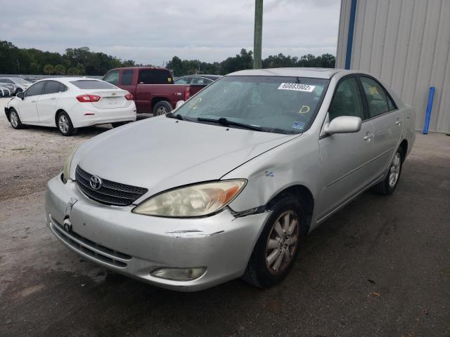 Photo 2 from auction – 2004 TOYOTA CAMRY LE with VIN 4T1BF30K74U569450