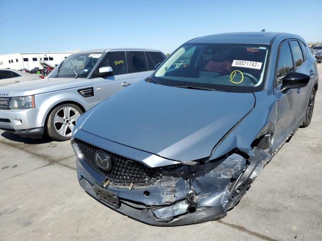 Photo 2 from auction – 2021 MAZDA CX-5 TOURI with VIN JM3KFACM5M0379487