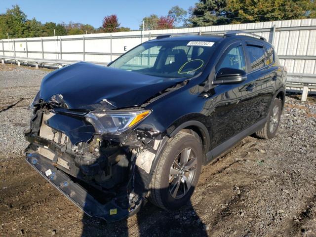Photo 2 from auction – 2017 TOYOTA RAV4 XLE with VIN 2T3RFREV1HW584463