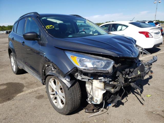 Photo 1 from auction – 2018 FORD ESCAPE SE with VIN 1FMCU9GD1JUA93423