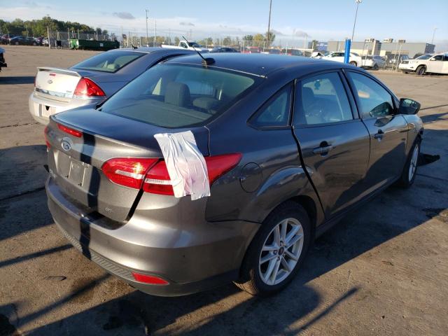 Foto 4 de la subasta – 2018 FORD FOCUS SE con VIN 1FADP3F2XJL321041