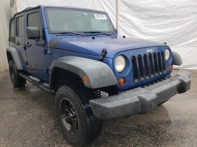 JEEP WRANGLER U 2009 with VIN 1J4GB39199L753974 - Photo from auction