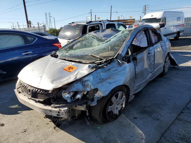 Photo 2 from auction – 2010 HONDA CIVIC LX with VIN 19XFA1F54AE045127