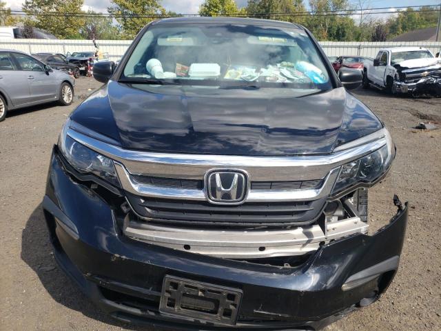 Photo 9 from auction – 2019 HONDA PILOT LX with VIN 5FNYF6H12KB025603