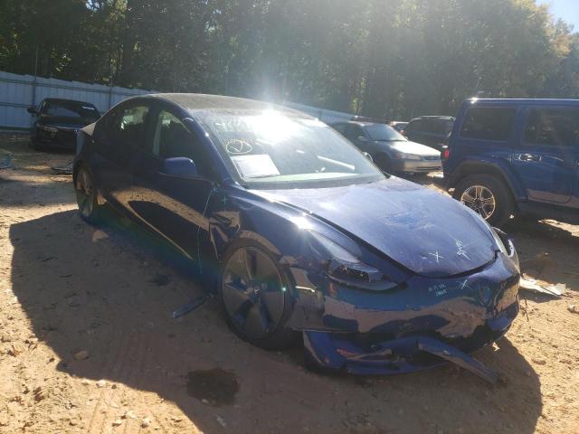 TESLA MODEL 3 2022 with VIN 5YJ3E1EA3NF237869 - Photo from auction