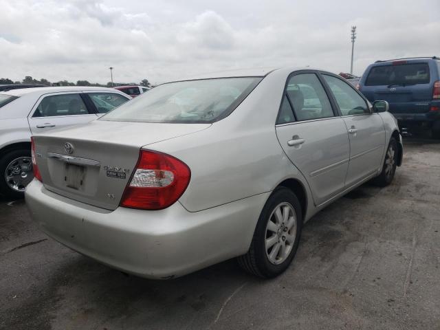 Photo 4 from auction – 2004 TOYOTA CAMRY LE with VIN 4T1BF30K74U569450