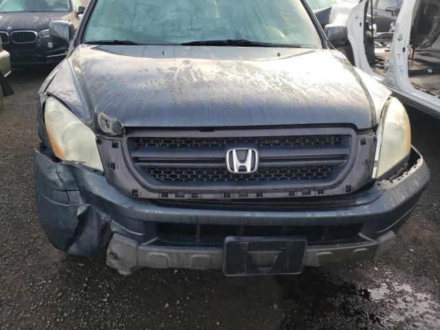 Photo 9 from auction – 2004 HONDA PILOT EX with VIN 2HKYF18404H582379