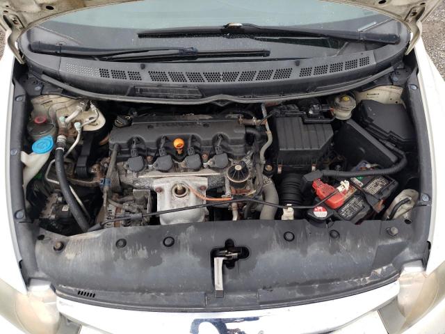 Photo 7 from auction – 2010 HONDA CIVIC DX with VIN 2HGFA1F28AH015673