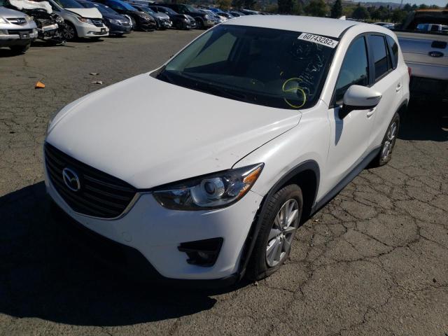 Photo 2 from auction – 2016 MAZDA CX-5 TOURI with VIN JM3KE2CY0G0785290