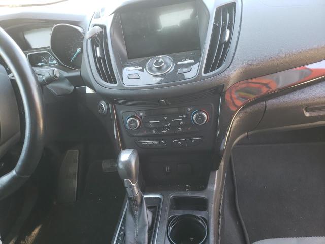 Photo 9 from auction – 2017 FORD ESCAPE TIT with VIN 1FMCU0J97HUC38684